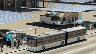 a bus and vans at a charging station