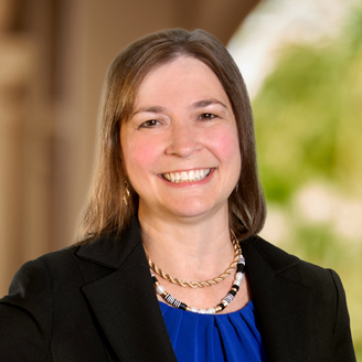 a woman in a black suit