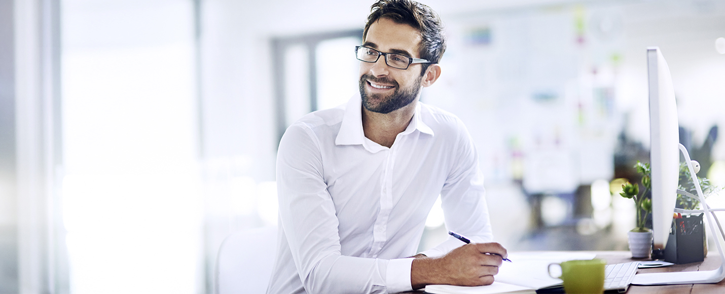 Man with glasses in office