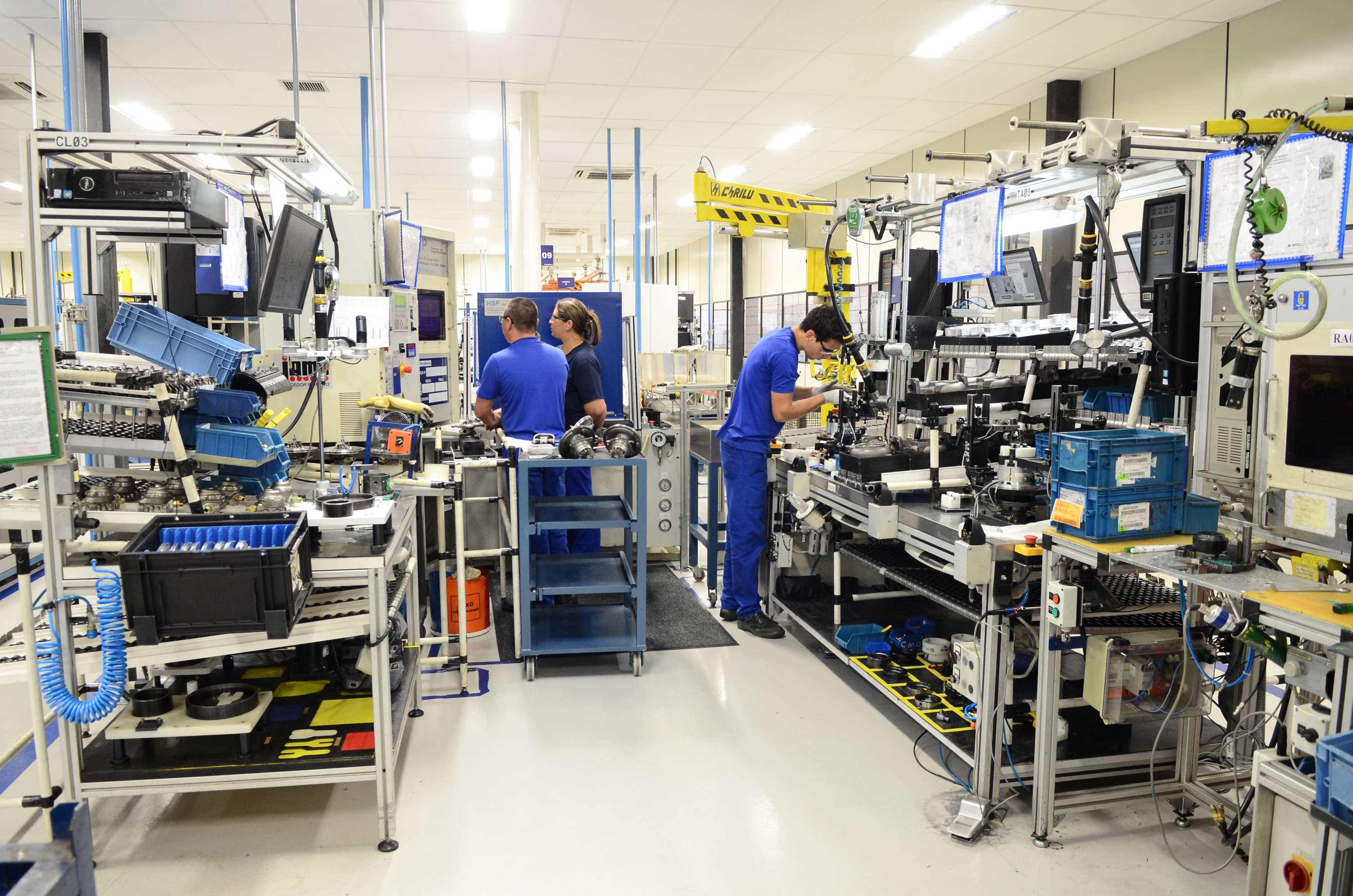 a group of people working in a factory